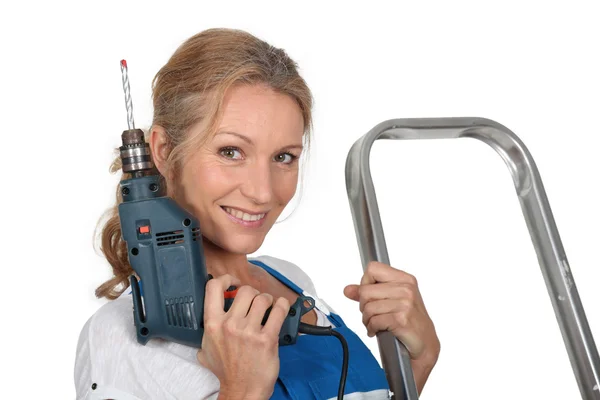 Woman ready with drill — Stock Photo, Image