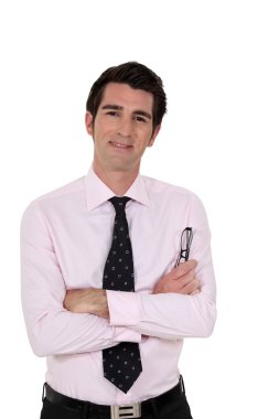 Businessman with his arms folded clipart
