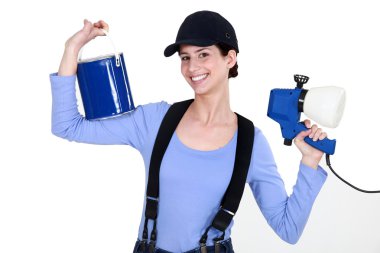 Woman holding paint sprayer clipart