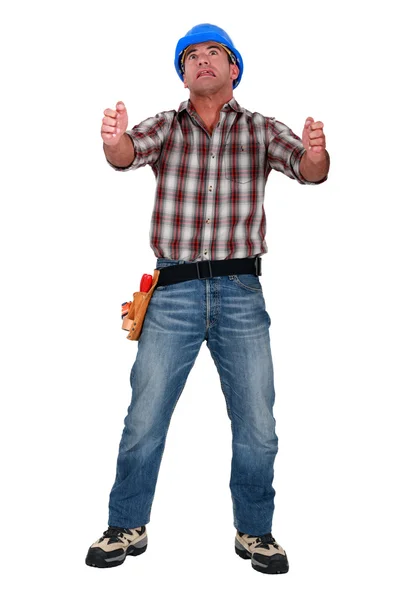 Laborer gripping an imaginary ladder — Stock Photo, Image