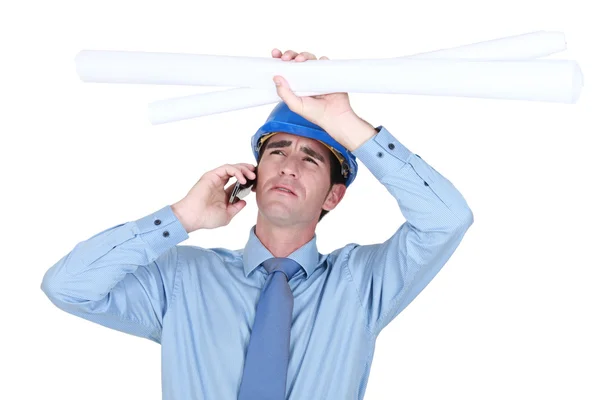 Architect receiving bad news over the phone — Stock Photo, Image