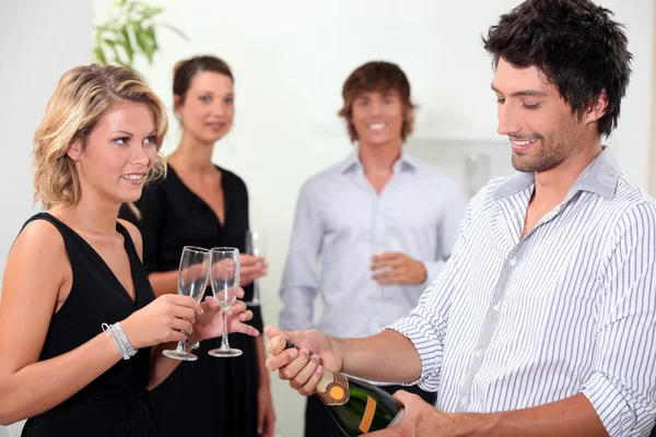 Popping the champagne — Stock Photo, Image