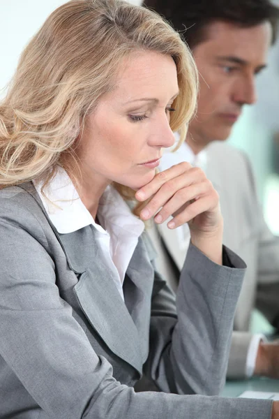 stock image Woman thinking in meeting