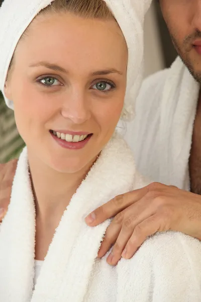 Blonde woman wearing a dressing gown — Stock Photo, Image