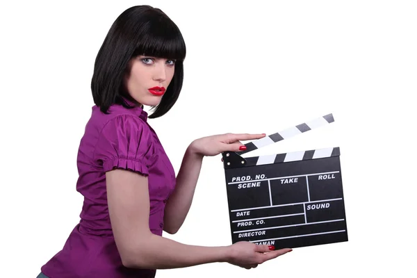 Brunette vrouw met een klap bioscoop — Stockfoto