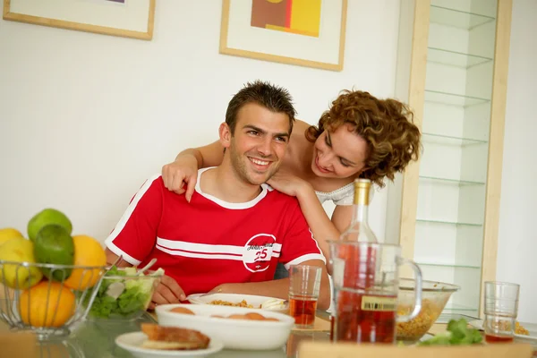 Young couple having breakfast — Stock Photo, Image