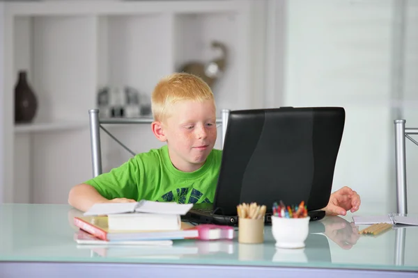 Little boy doing his homework at home — Stock Photo, Image