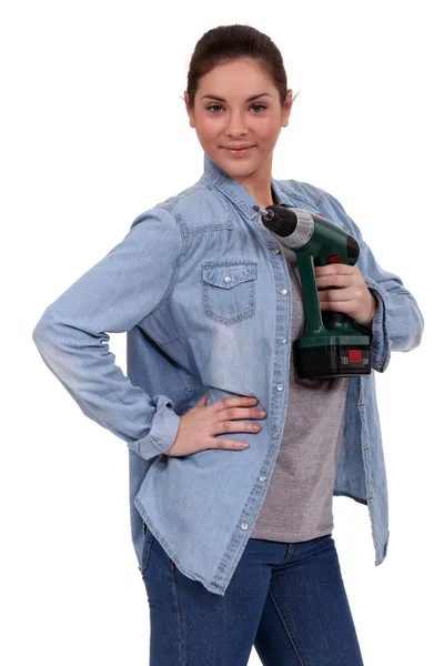 Handywoman posing with a power drill — Stock Photo, Image