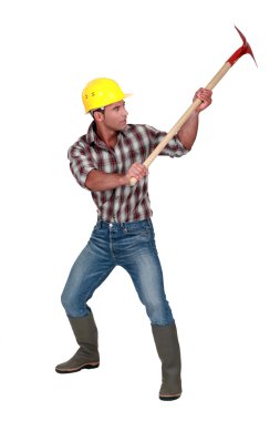 Man raising showel over head clipart