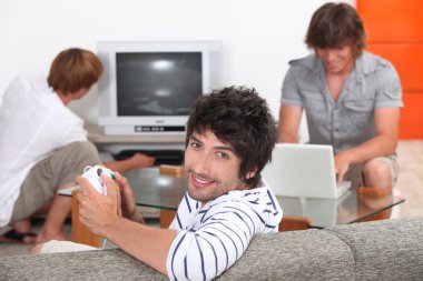 Guys playing computer games clipart