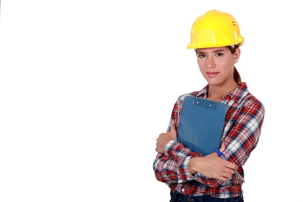 A female foreman with a clipboard. — Stock Photo, Image
