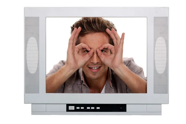 stock image Man making a silly face inside a television frame