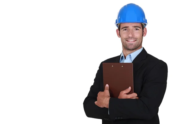 Handsome architect with a clipboard — Stock Photo, Image