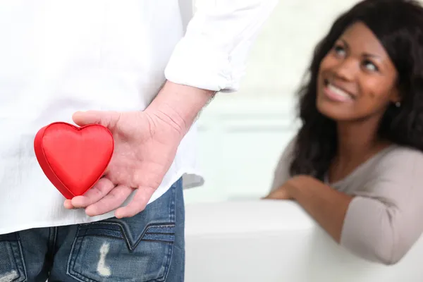 Man about to give his heart to his girlfriend — Stock Photo, Image