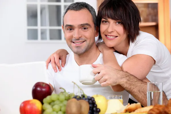Husband and wife having breakfast — Stock Photo, Image
