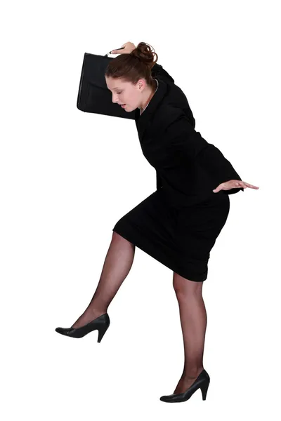 Businesswoman trying to balance — Stock Photo, Image
