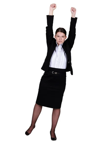 Uma mulher de negócios com os punhos para cima . — Fotografia de Stock