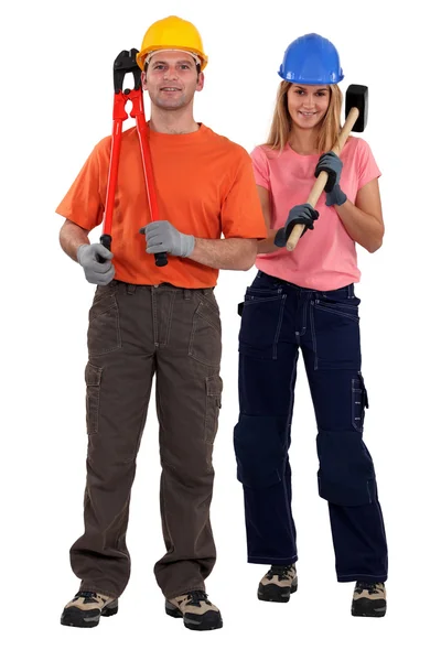 Man and woman with hammer — Stock Photo, Image