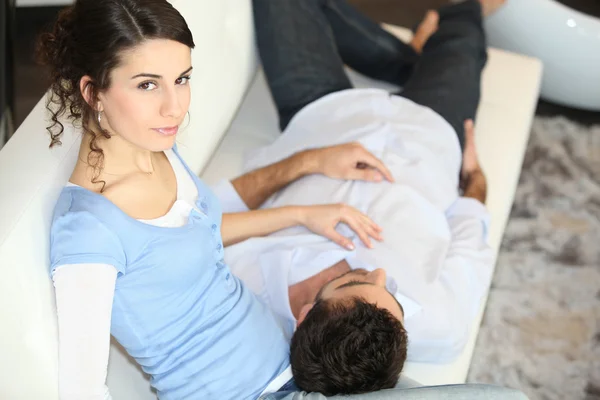 Man laying on girlfriend — Stock Photo, Image