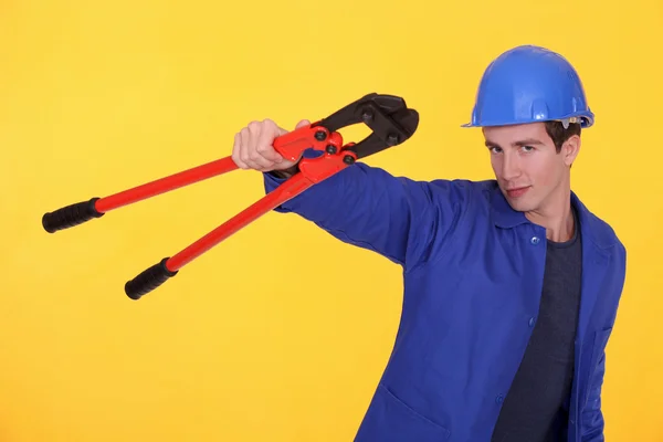 Young blue collar posing against yellow background — Stock Photo, Image