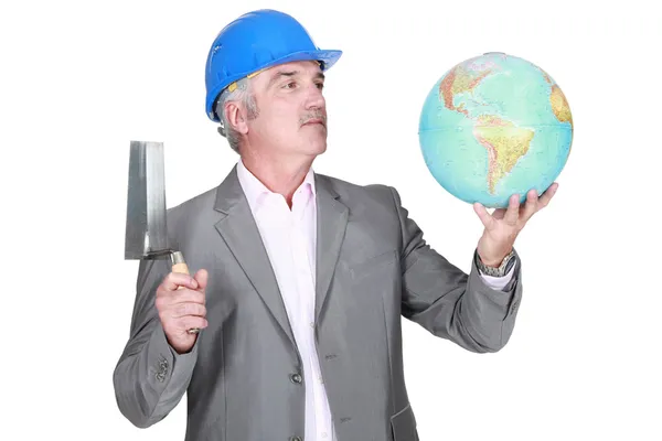 Engineer with a globe — Stock Photo, Image