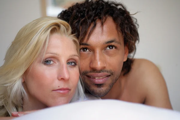 Couple laying in bed — Stock Photo, Image