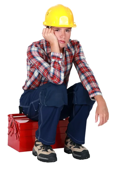 Een depressief vrouwelijke bouwvakker. — Stockfoto