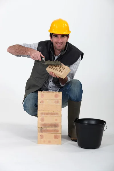 Pedreiro de tijolo — Fotografia de Stock