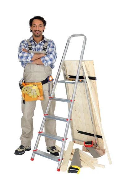 Man building a gate — Stock Photo, Image