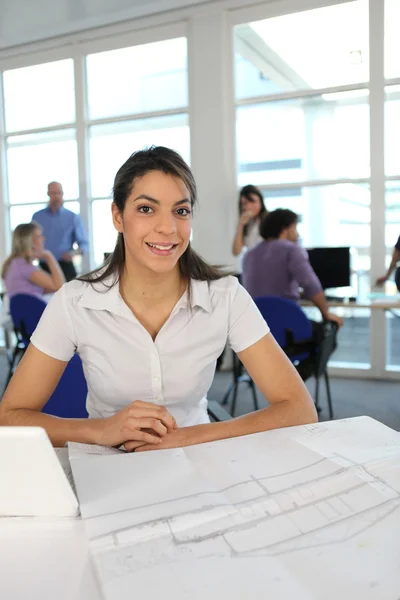 Smiling student in classroom — Stock Photo, Image