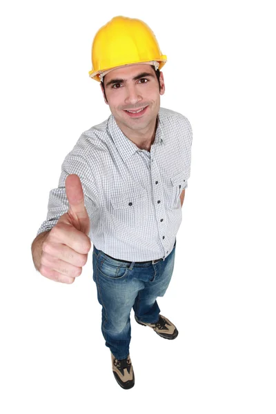 Construction worker giving the thumb's up Royalty Free Stock Photos