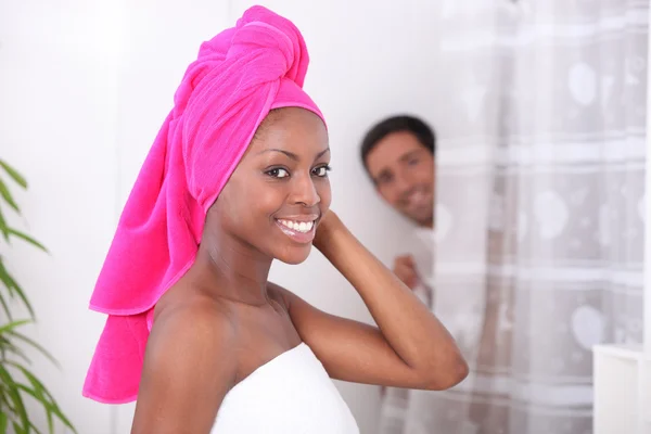 Portrait of a young woman in bathroom — Stock Photo, Image