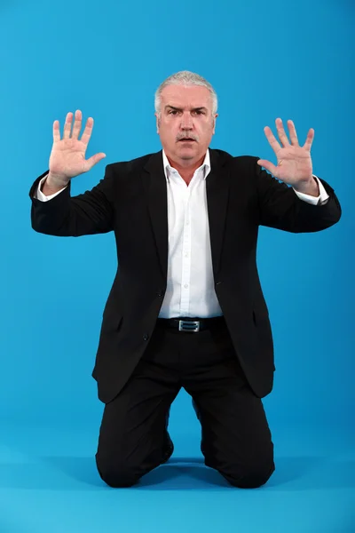 A businessman doing a mime. — Stock Photo, Image