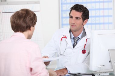 Doctor in appointment with patient clipart