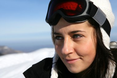 Portrait of a female skier clipart