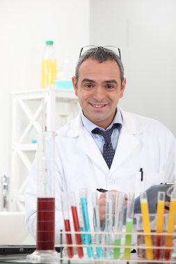 Scientist working in the lab clipart