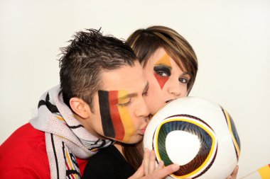 Couple of German football fans clipart