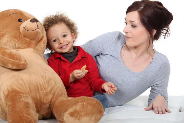 Mother with baby and teddy bear — Stock Photo, Image