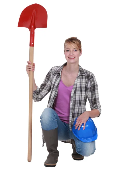 Женщина с лопатой — стоковое фото