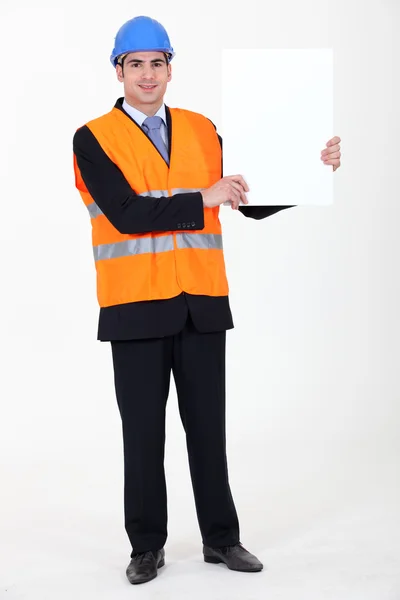 Construction worker poster showing white — Stock Photo, Image