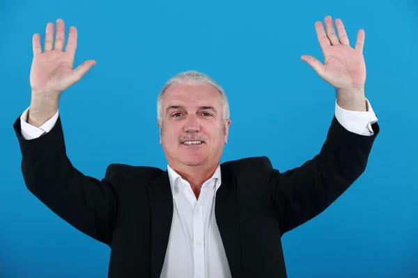 Businessman with his hands up — Stock Photo, Image