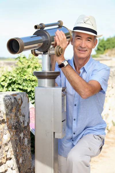 Portrait of a man with binoculars — Stock Photo, Image
