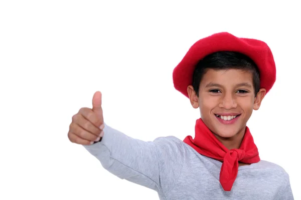 Kind mit rotem Schal und Baskenmütze — Stockfoto