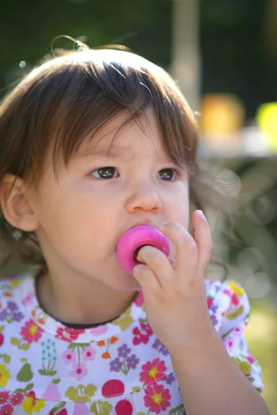 Child with a pacifier — Stock Photo, Image