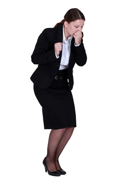 Businesswoman sneezing — Stock Photo, Image
