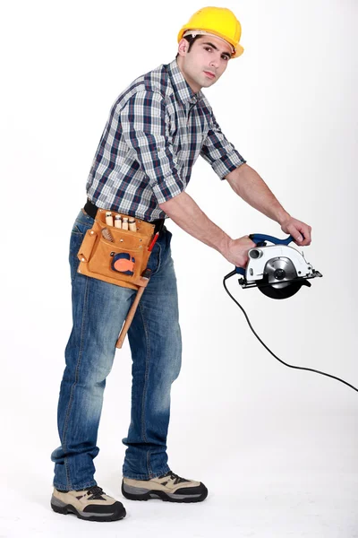 Man with a circular saw — Stock Photo, Image