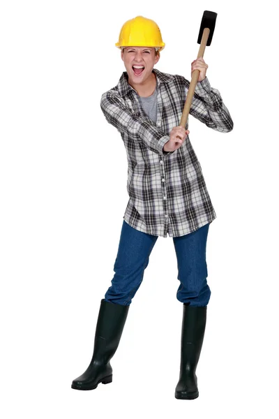 Woman with a sledgehammer — Stock Photo, Image