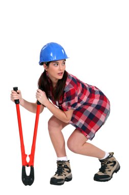 Sneaky woman with a pair of bolt cutters clipart