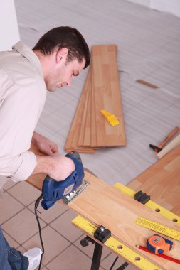 Portrait of a man sawing clipart