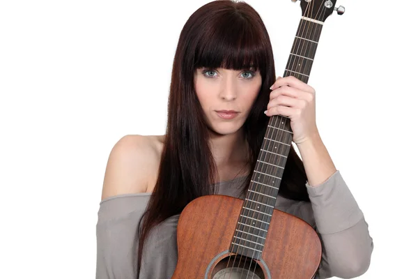 Woman with a guitar — Stock Photo, Image